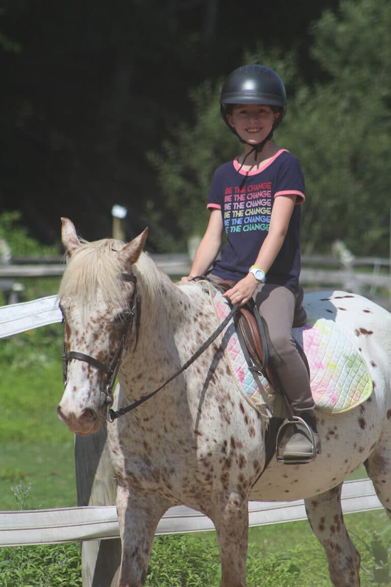 Horse riding in summer camp